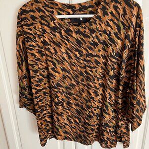 70's animal print top with shoulder pads!